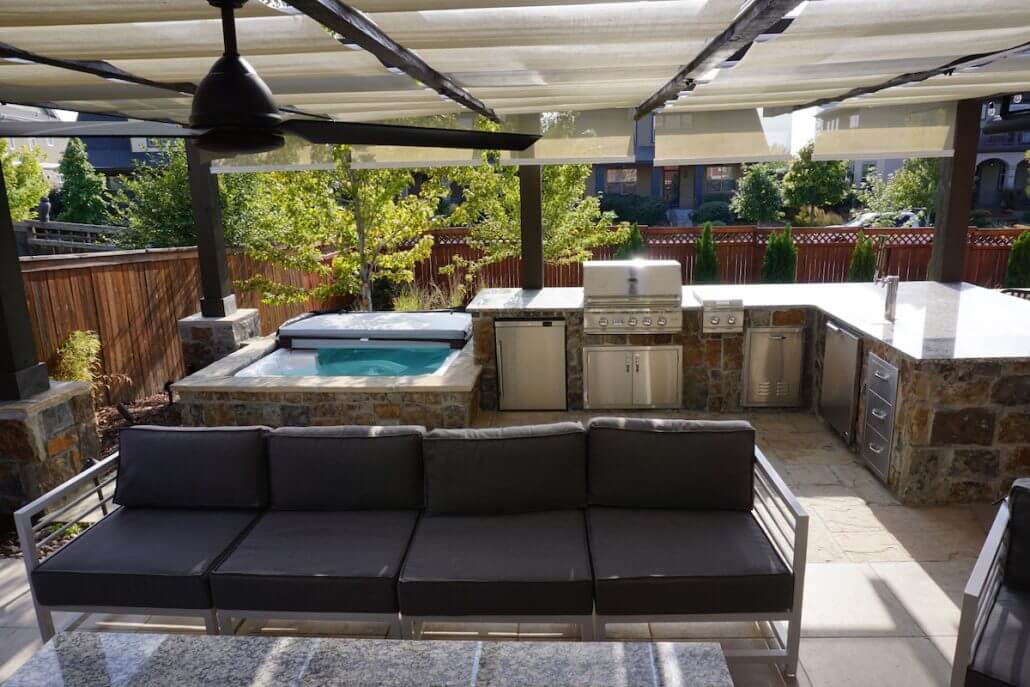 Pergola Outdoor Kitchen Stone Patio Lowry Co Roof Decks Pergolas And Living Spaces - Patio With Fireplace And Hot Tub